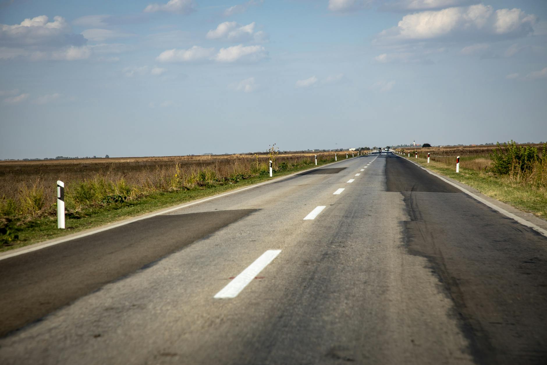 Two roads diverging from above to illustrate CRM vs ERP choice