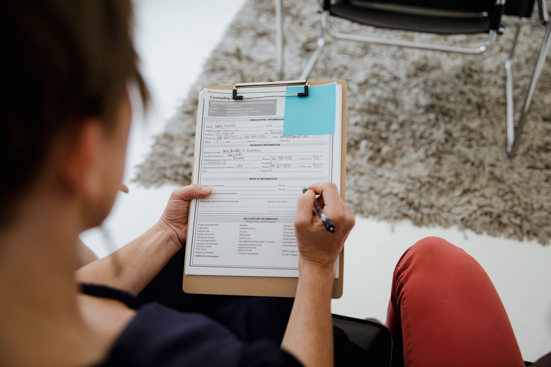 SMB buyer comparing essential CRM features on a checklist
