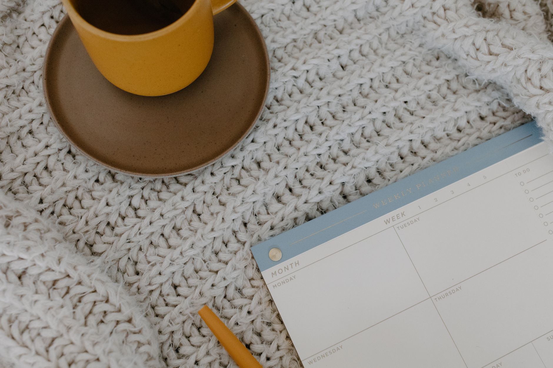 Person scheduling a meeting in a CRM calendar on a tablet