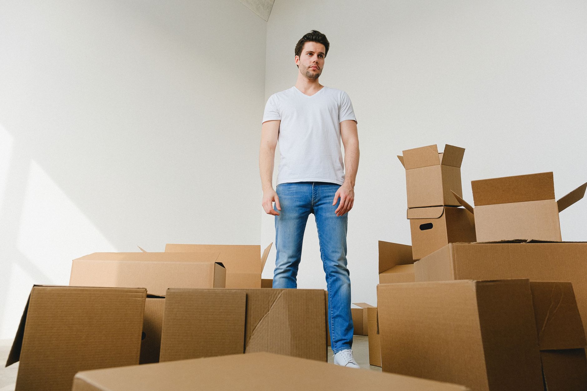 Moving boxes in an office representing a CRM migration to a new provider