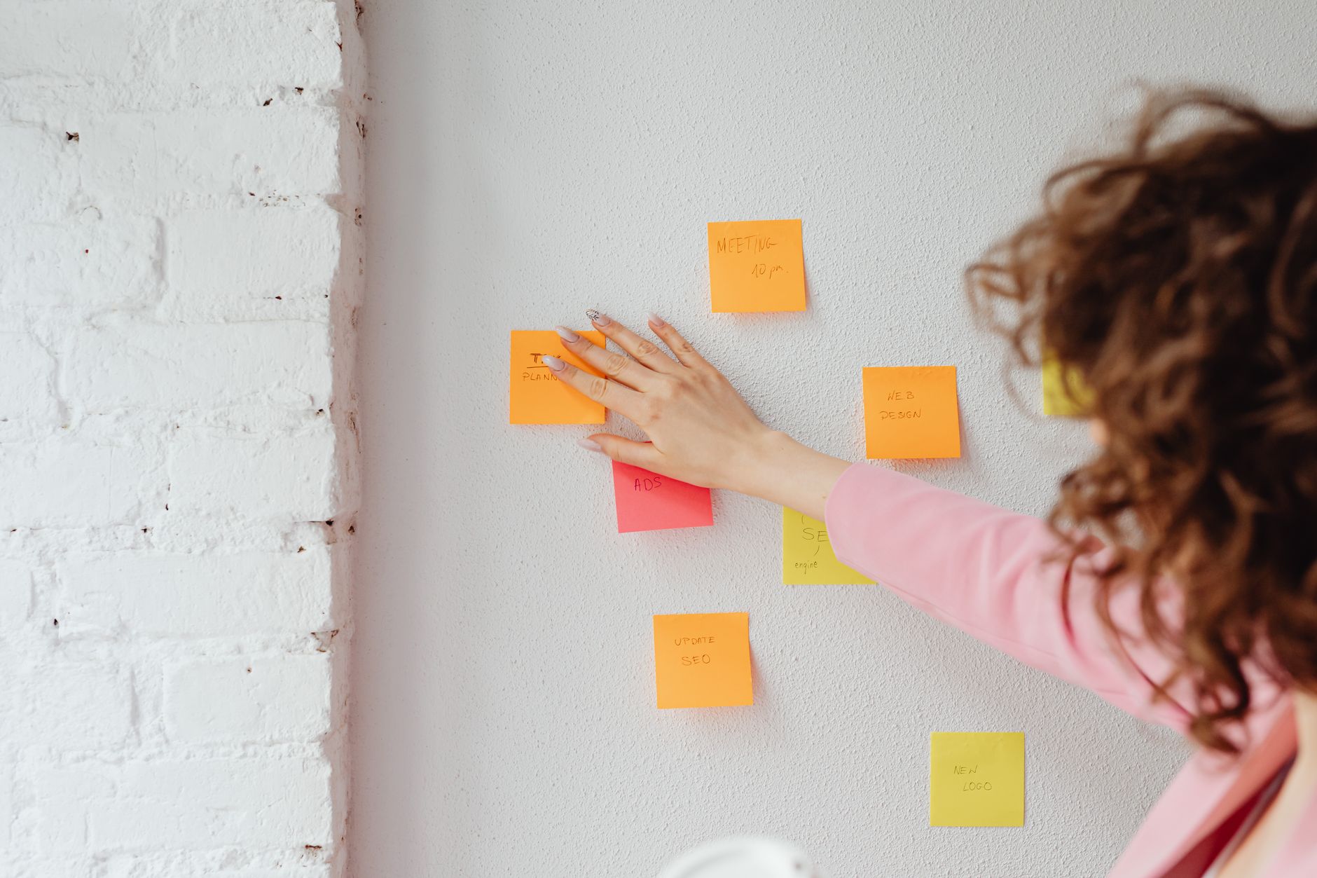 Sales manager reorganizing pipeline stages on a digital kanban board
