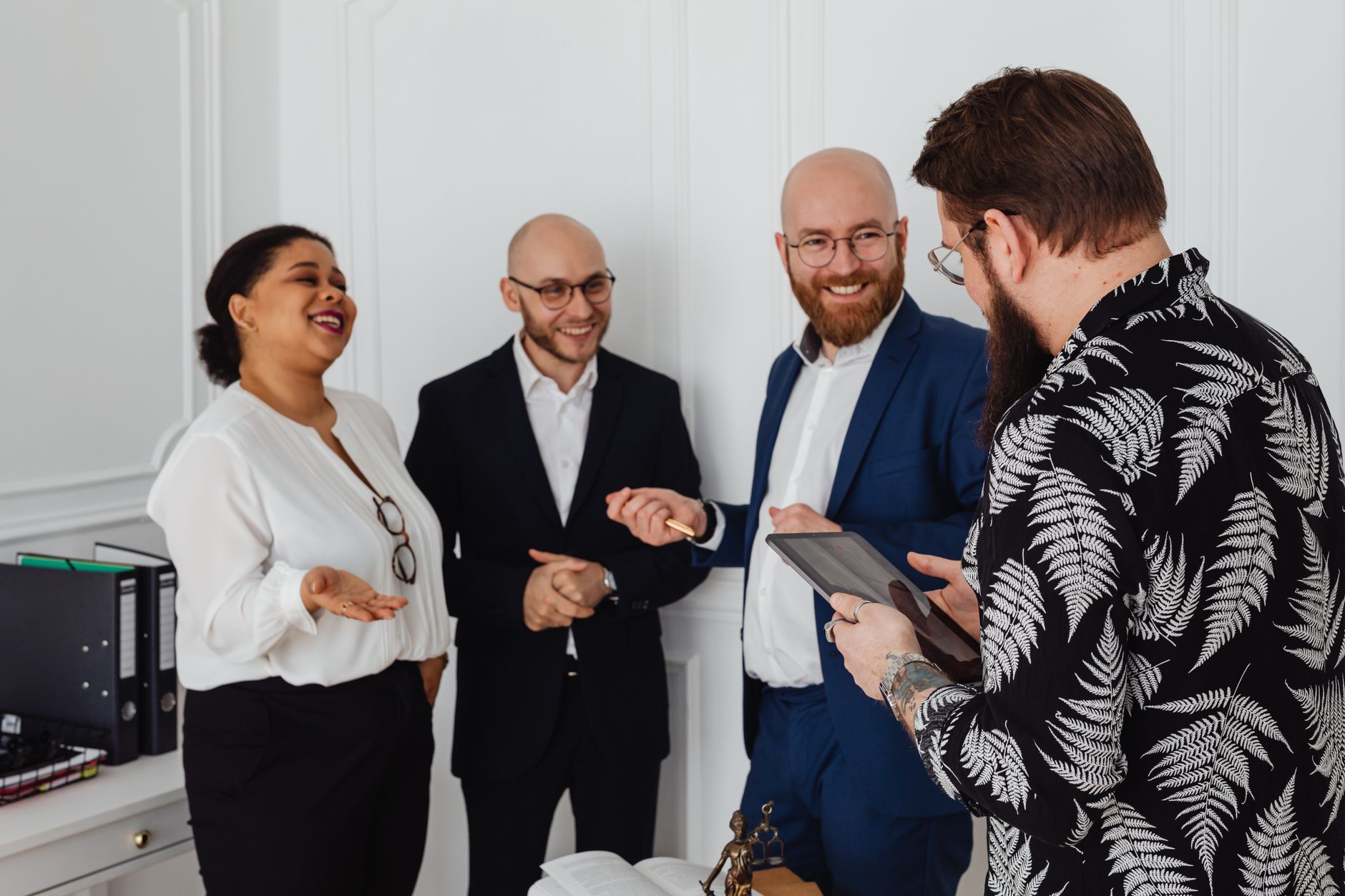 Sales professional reviewing a qualification checklist during a discovery call